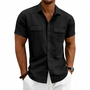 Detailed view of black linen short sleeve utility shirt with chest pockets.