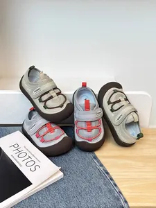A group shot of breathable mesh children's sneakers with soft soles and velcro straps