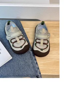 Top view of breathable children's mesh sneakers with soft soles and velcro straps