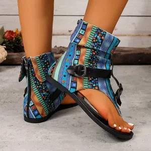Ethno-style bohemian print thong sandals with ankle wrap and buckle detail for women.