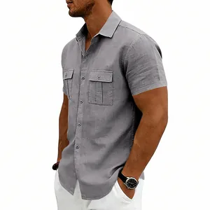 Macro detail of grey men's linen workwear shirt with two functional button pockets