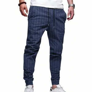 Pantalon de jogging rayé bleu pour hommes en lin avec cordon de serrage et coupe fuselée.