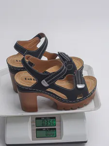 Digital scale displaying the lightweight 0.350kg weight of these black platform sandals