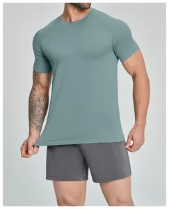 Detailed close-up of men's seamless breathable athletic short sleeve t-shirt in teal color