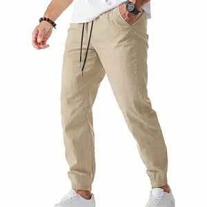 Détail du jogging en lin à rayures pour hommes avec cordon de serrage et poignets