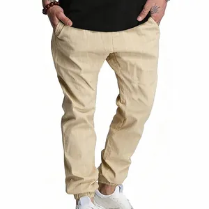 Pantalon de jogging rayé en lin kaki pour homme avec revers élastiques pour l'été