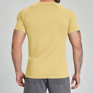 Yellow men's seamless quick-dry athletic t-shirt for fitness and gym, back view
