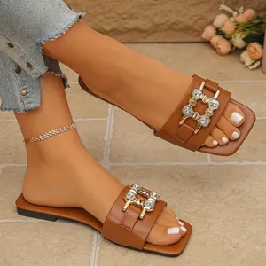 Brown square toe flat slide sandals for women with decorative rhinestone metal buckle