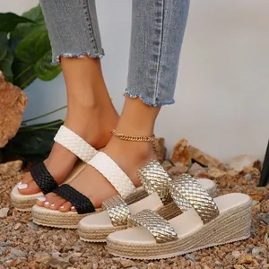 Sandales compensées avec brides tressées et semelles plateforme espadrilles en noir