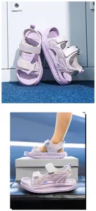 Detailed side view of lavender kids sports sandals with breathable flame design and velcro straps