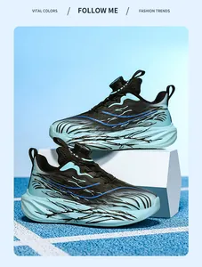 Side view of boys athletic shoes featuring a convenient rotary buckle and blue gradient design