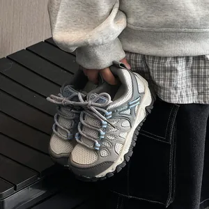 Grey breathable mesh hiking shoes for boys featuring thick chunky non-slip soles