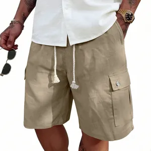 Detail view of khaki cotton linen cargo shorts featuring drawstring and side utility pocket