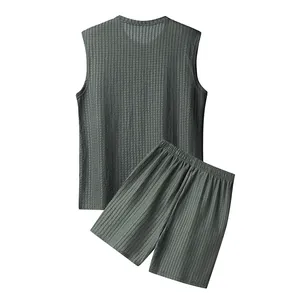 Detailed view of dark grey waffle knit textured men's tank top and shorts set