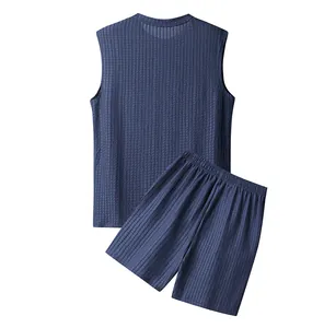 Men's navy blue waffle textured two-piece vacation set featuring tank top and shorts