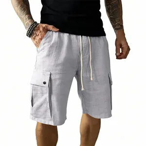 Close-up view of light grey men's cargo shorts showing linen fabric and side pocket detail