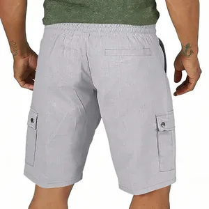 Back view of light grey men's linen cargo shorts with elastic waist and side pockets