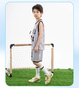 Kids gold soccer cleats with TF studs for artificial turf shoes.