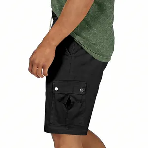 Close-up detail of the side cargo pocket on black outdoor cotton linen shorts