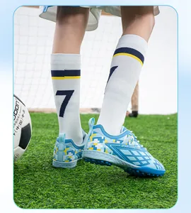 Children's TF soccer shoes with non-slip studs on artificial turf field