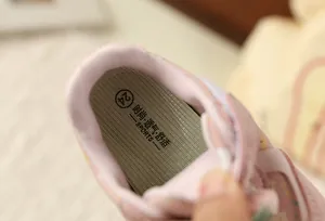 Close-up detail of the breathable and soft insole of the pink floral sports shoe for girls