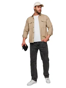 Full view of men's slim-fit casual washed jeans in charcoal grey with stylish outfit