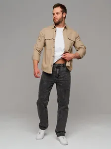 Model wearing men's slim fit dark grey acid wash casual jeans with a khaki shirt