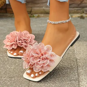 Elegant pink flower flat slippers for women, casual summer beach sandals with floral design.