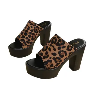 Elegant leopard print platform slides featuring high block heels for summer fashion