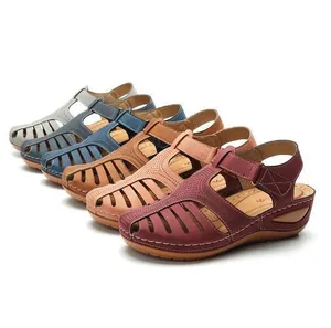 Detail of women's retro hollow-out wedge sandals in five vibrant assorted colors.
