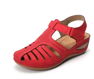 Elegant red retro closed-toe wedge sandals for women with hollow octopus cutout design