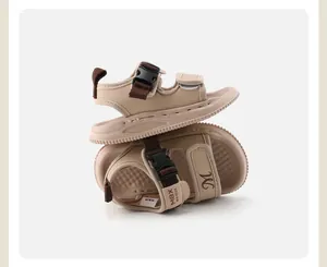 Detailed side view of beige toddler outdoor sandals featuring soft non-slip soles