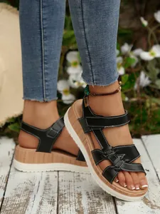 Fashionable black platform sandals with wood-grain sole and velcro straps for women