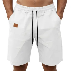 Front view detail of white quick-dry men's casual beach shorts with black adjustable drawstring