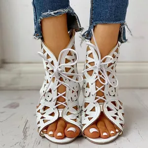 Damen Ethno Flache Sandalen Laser Cut Schnürung PU Leder Atmungsaktive Sommer Strand Schuhe Römische Sandalen