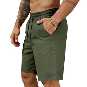 Detail view of army green quick-dry mens shorts featuring elastic drawstring waistband
