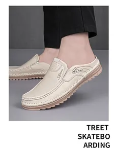 Detail shot of men's beige leather half loafers with slip-on design and soft sole