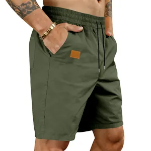 Close-up of men's quick-dry army green casual shorts with drawstring