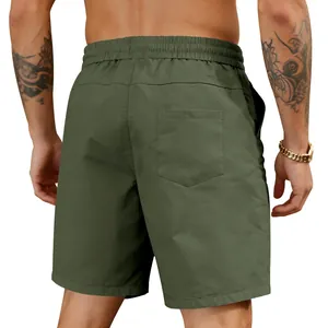 Rear view of men's olive green quick-dry shorts with elastic waist and back pocket