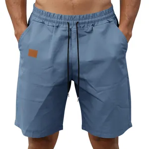 Close-up of men's quick-dry casual beach shorts in blue with elastic drawstring waist