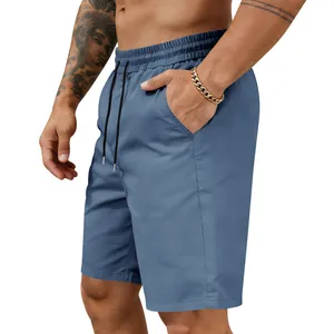 Detailed view of blue men's quick-dry beach shorts with elastic drawstring waist