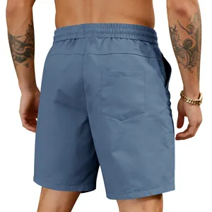 Rear view of blue men's quick-dry summer beach shorts with elastic waist