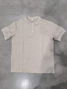 Close-up view showing the unique zig-zag jacquard texture of this khaki cotton polo shirt