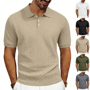 Detail view of heavyweight textured jacquard polo shirt showing multiple color options