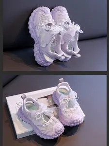 Detail of purple girl's princess sandals with pearl bows and breathable mesh upper