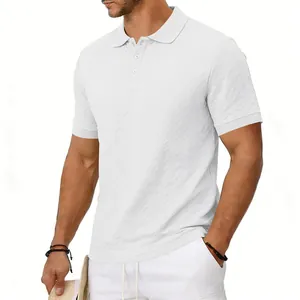 Detailed macro shot of white textured jacquard knit on heavy weight short sleeve polo shirt