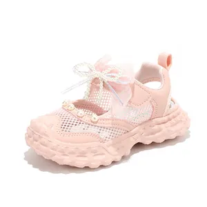 Stylish pink girls sandals with mesh upper, pearl bow decoration and soft chunky sole