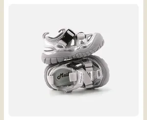 Close-up view of silver baby walking sandals with breathable mesh and Velcro straps