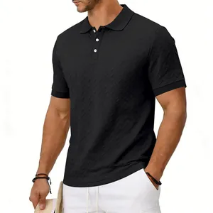 Detail view of black textured short-sleeve polo shirt featuring heavy jacquard knit