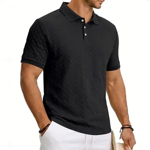 Close-up of men's black polo shirt featuring a premium jacquard herringbone texture.
